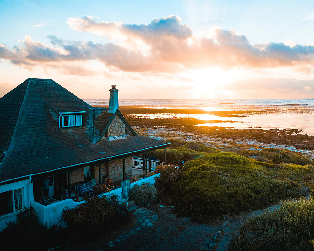 A sunset image of a luxury holiday home.